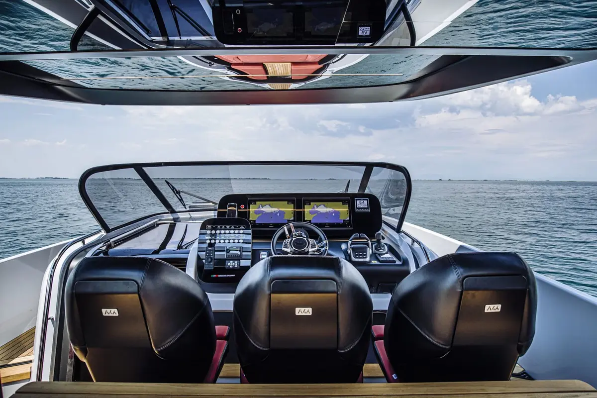 Cranchi A46, exterior — Yacht Hire Saint-Tropez, Saint-Tropez. An open-deck sunset run along the Saint-Tropez coast